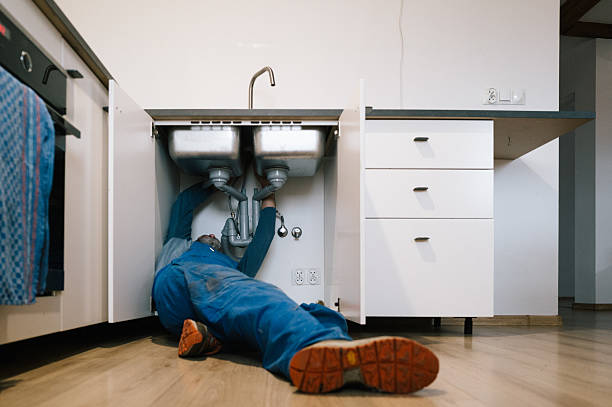 Professional Drain Cleaning technician working in Janesville, IA